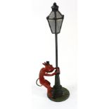 Heyde. Knick-knack/nippes lead devil straddling a lamp post, 17cm high.