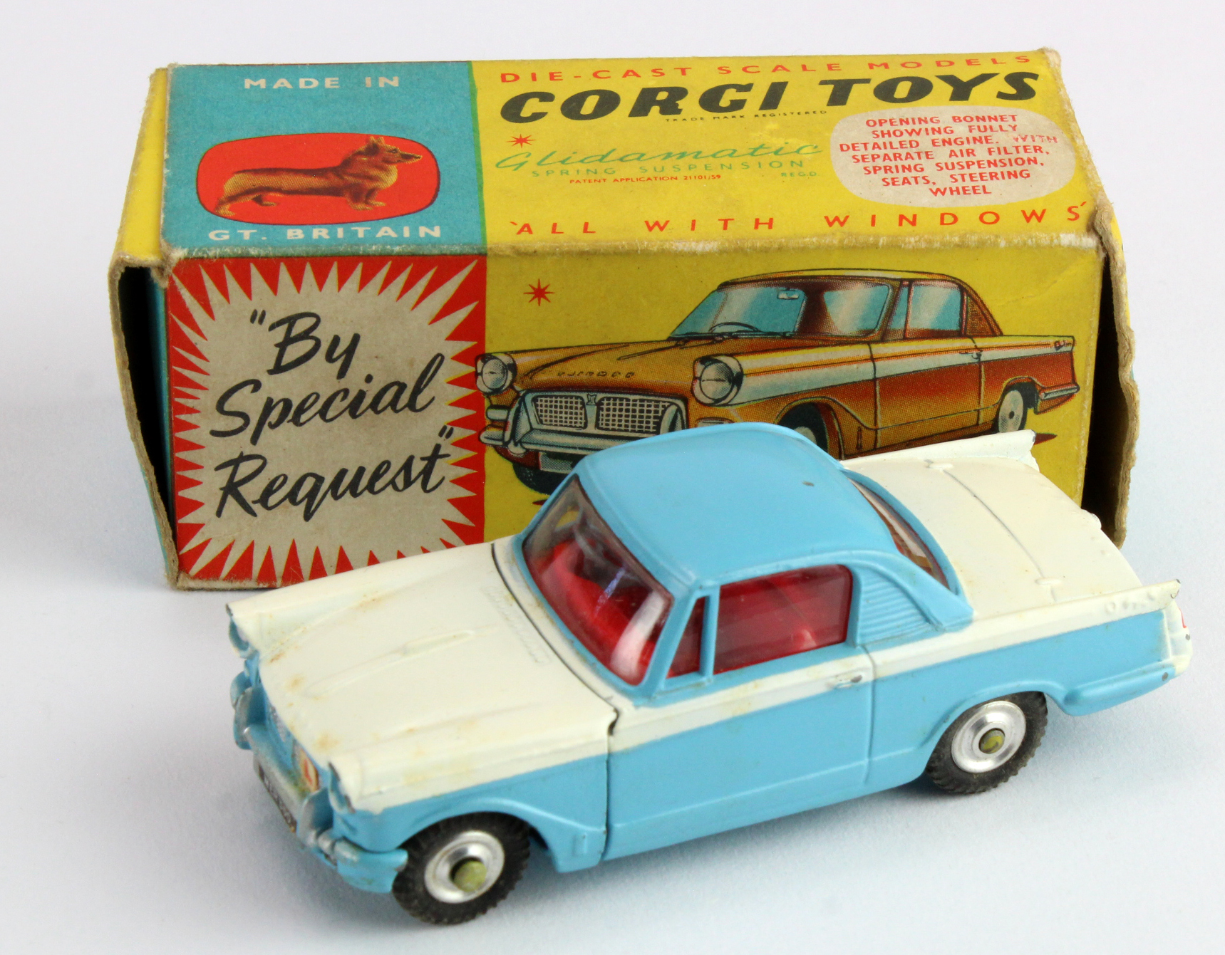 Corgi Toys, no. 231 'Triumph Herald Coupe' (blue / white), contained in original box