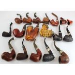 Pipes a collection of approximately sisteen various smoking pipes