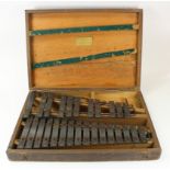 Xylophone by Hawkes & Son, makers plaque to inside of lid, contained in original wooden case