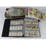 Box of various loose cigarette cards in sleeves in 2x binders, mostly type cards, plus a quantity of