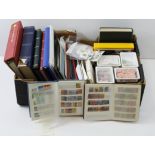 British Commonwealth in large banana box housing several albums/stockbooks and many in packets, tins