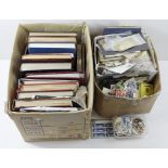 Large quantity of general World mix in two boxes. Larger consists of approx 12 albums/stockbooks