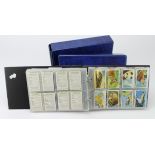 Collection of Will's & others sets & part sets contained in 2x modern albums, cat value of sets
