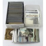 Shoebox and plastic tub with a very mixed range of loose old postcards, majority GB. (100's) (2)