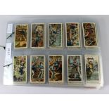 Bundle of vintage cigarette cards in sleeves from c1903 - 1910. Including Life on board a Man of