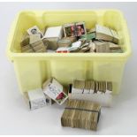 Yellow plastic tub of loose cigarette cards. (approx 3000)