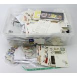 Large plastic crate of World material, large proportion GB in packets and bags, some on paper