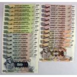 Uganda (23), a group of notes with portrait of Idi Amin at left, 100 Shillings (7), 50 Shillings (