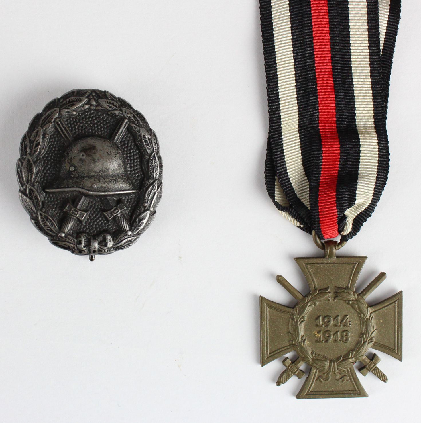 Imperial German Hindenburg Cross and Black Wound Badge. (2)