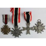 German Nazi medals - War Merit Cross with Swords x2, War Merit Cross without Swords, and a 1914-1918