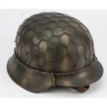 German Nazi M42 Helmet in Normandy Camouflage and Chicken Wire Netting.