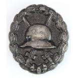 German Black Wound badge, hollow backed, with award document to Reichsbahn Betriebs Assistent
