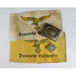 German Luftwaffe armbands, belt buckle and lapel badge. (4 items)