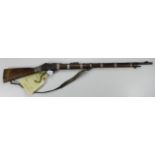 Rifle - an interesting .303 Martini / Enfield brought back from Oman. Stock with silver