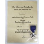 German 25 Year Faithful Service medal with award document to Dem Postasistenten Egid Baumann dated