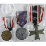 German WW2 Luftschutze civil defence medal with war merit medal and war merit cross without swords.