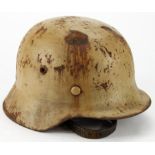 German Nazi M38 steel helmet Africa Corps markings complete with liner signs of age and rusting.