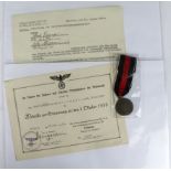 German 1st October 1938 medal with award document to Schutzen Heinrich Duriger, dated 28-10-1939,