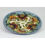 Moorcroft 'Tiger Lily' Trial Plate, by Nicola Slaney. 1st quality. Measures 22cm dia.