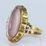 14ct yellow gold elongated oval rose quartz cabochon measuring approx. 20mm x 5mm, finger size W,