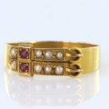 15ct buckle ring with seed pearls and rubies, hallmarked Birmingham 1896. Size U, weight 3g