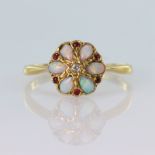 18ct yellow gold ring set with a central old cut diamond weighing approx. 0.02ct, surrounded by