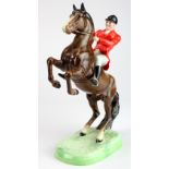 Beswick huntsman on rearing horse (no. 868), height 23.5cm approx.