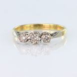 18ct yellow and white gold ring set with three graduated round brilliant cut diamonds totalling