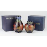 Two Moorcroft "Pomegranate" Vases signed Walter Moorcroft on base. Approx 12cm & 8cm tall. 1st