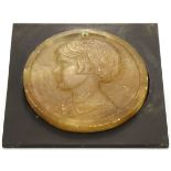 Carved Danish (Possibly Copenhagen) plaque. Early 1900's, depiciting a relief portrait of a woman in
