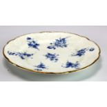 Nantgarw porcelain plate with embossed borders, with blue floral decoration & gilt rim, impressed