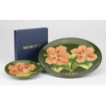 Moorcroft 'Hibiscus' 1968 Plate along with a Hibiscus pin dish. Boxed