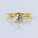 18ct yellow gold solitaire ring set with a round brilliant cut diamond calculated as weighing