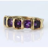 9ct yellow gold ring set with five round amethysts with bar settings, finger size O, weight 5.5g