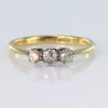 18ct yellow gold ring set with three round old cut diamonds in claw settings totalling approx. 0.