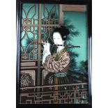 Chinese interest. A large Chinese reverse painting on glass, depicting a female figure playing the