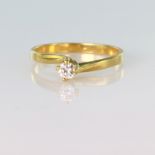 18ct yellow gold solitaire ring set with a round brilliant cut diamond weighing approx. 0.15ct in
