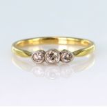 18ct yellow gold three stone graduated diamond ring, centre round brilliant cut diamond weighing