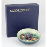 Moorcroft "Spring Flowers" small blue dish. Approx 12cm dia. 1st quality. Boxed