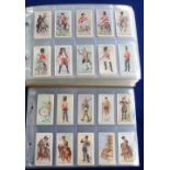 Cigarette & trade cards, an album containing various sets and part-sets of Military cards inc.