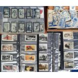 Cigarette & trade cards, a collection of cards in various vintage corner-mount albums, folders, &