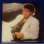 Autograph, Michael Jackson, signed and inscribed album record sleeve for Thriller, signed in red ink