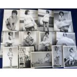 Glamour photographs, a collection of 29 b/w photos, 1950's/60's, approx. 17cm x 22cm, showing