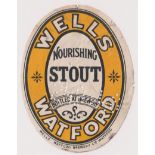 Beer label, Wells, Watford, Nourishing Stout, vertical oval, 85mm high, (slightly grubby/fair) (1)