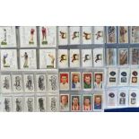 Cigarette cards, a collection of 8 sets, Churchman's Famous Cricket Colours, Lambert & Butler