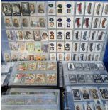 Cigarette cards, a large quantity of cards in albums & sleeves, various issuers & series inc.