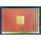 Victorian Photograph Album a red leather album with brass bindings and brass monogrammed device to