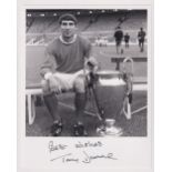 Football autograph, Tony Dunne, Manchester United, a b/w photo, being a reprint taken from earlier