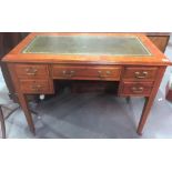 Edwardian writing table with green leather gilt tooled writing inset and moulded top over a kneehole